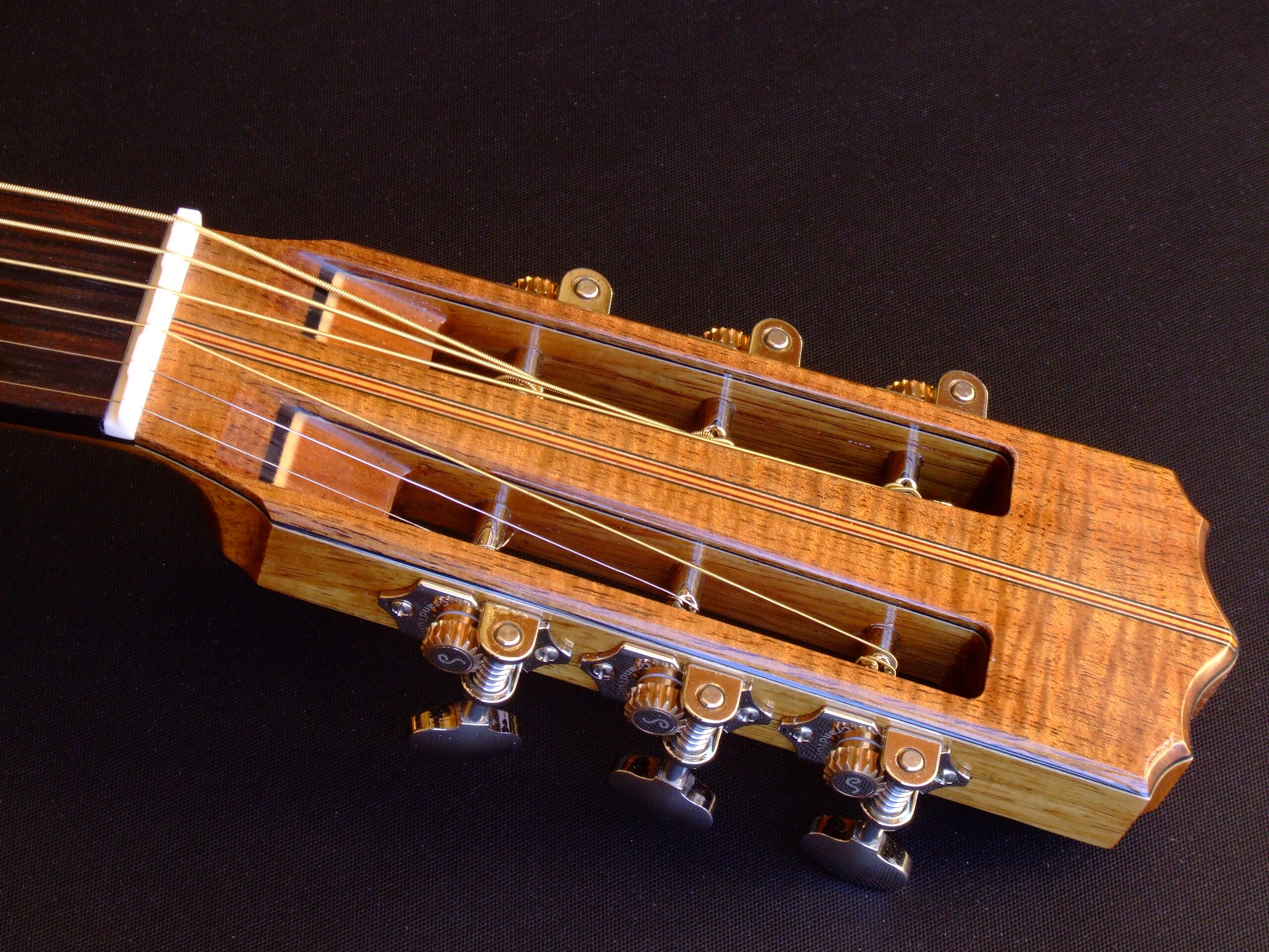 Slot headstock on a steel string guitar