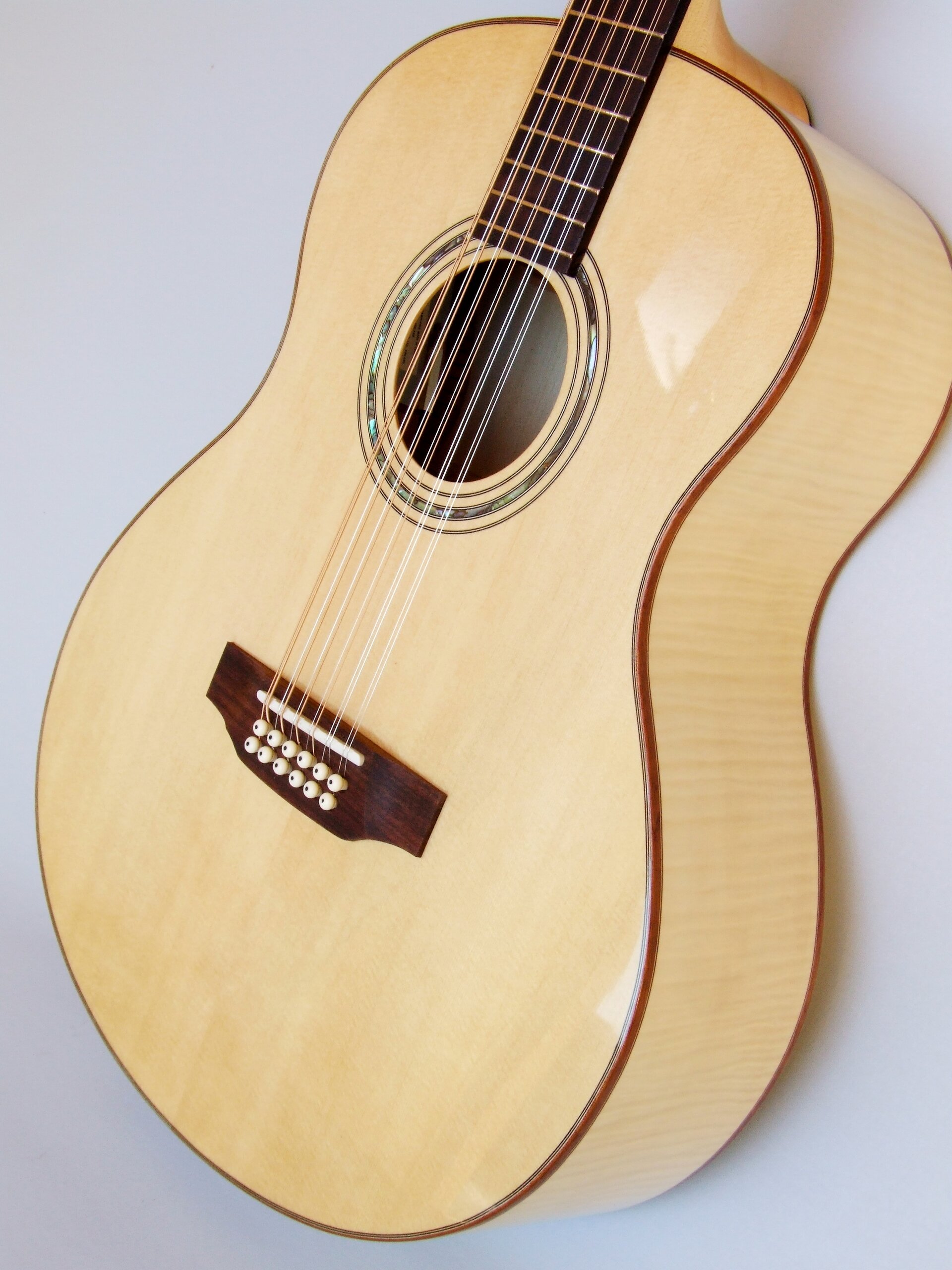 Custom guitars. 12-string maple bodied guitar by Trevor Gore