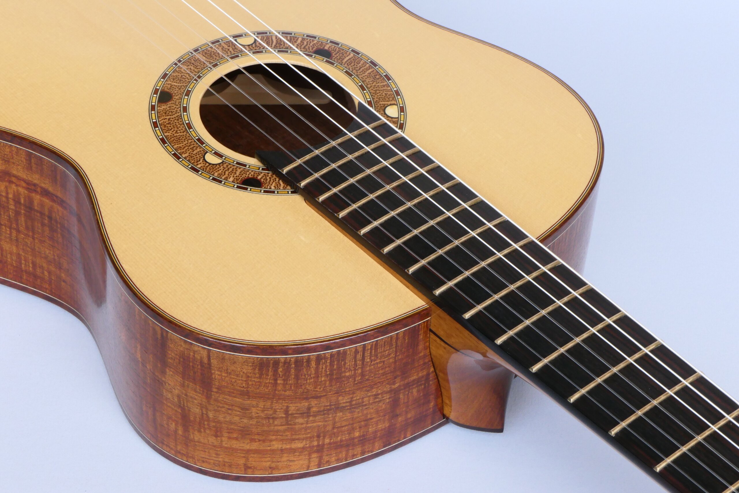 Custom guitars. Australiana rosette in an adjustable neck joint classical guitar