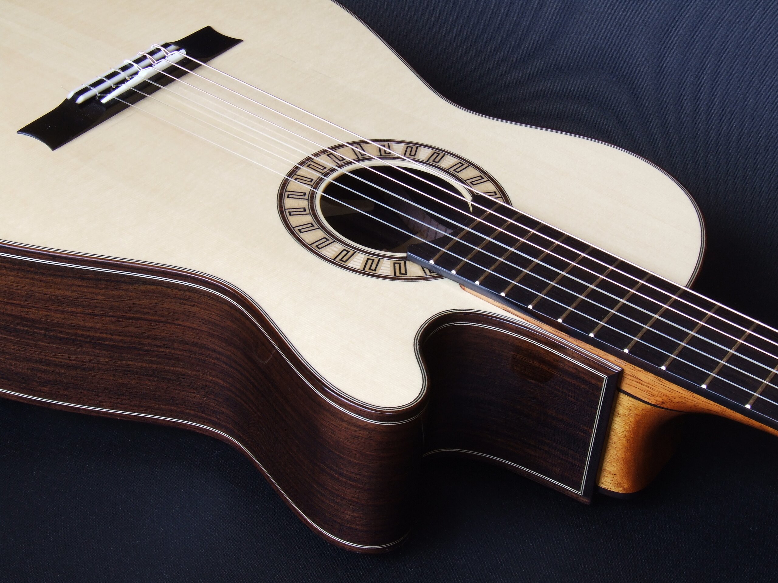 Custom guitars. Gore smallbody cutaway tilt-neck classical guitar