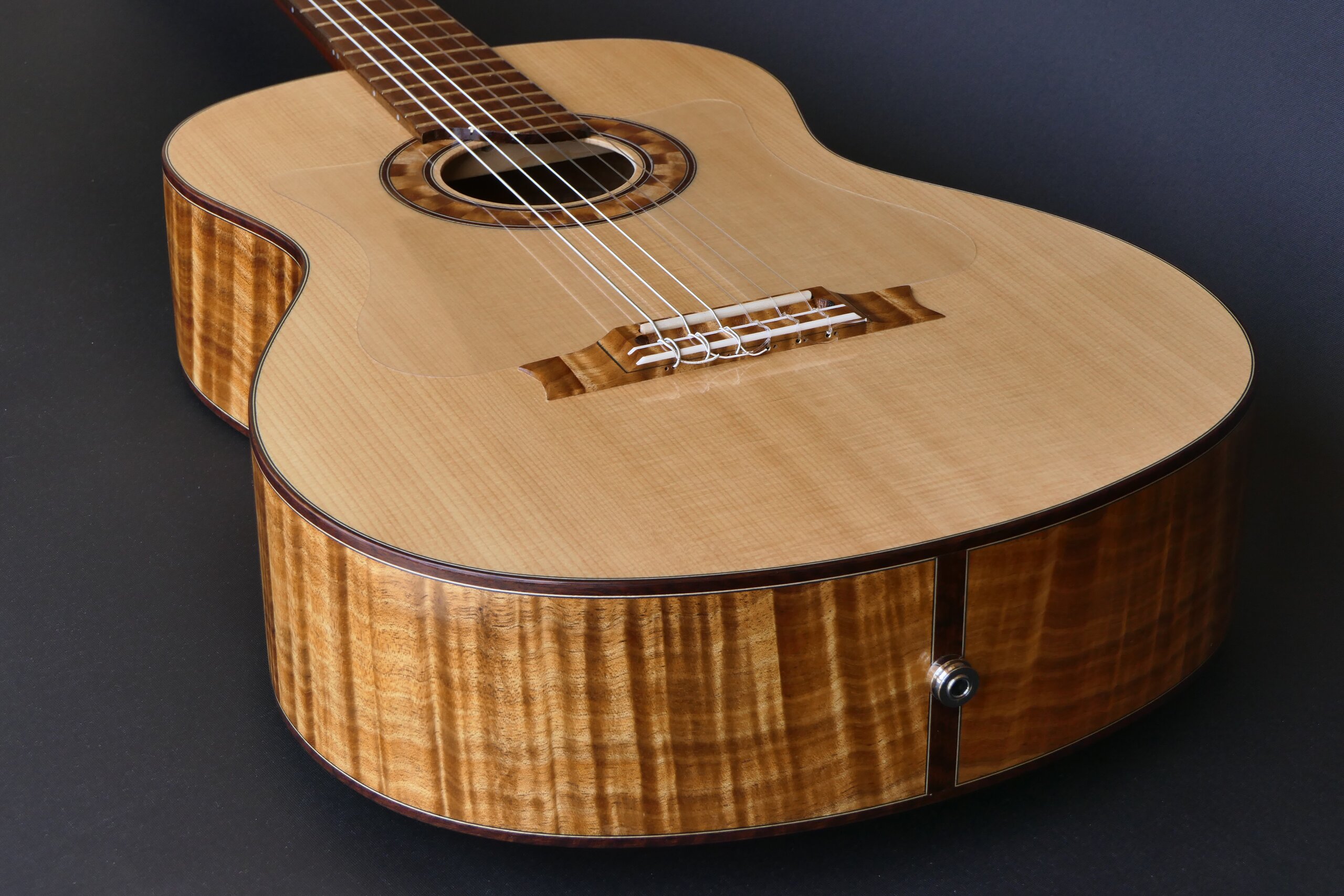 Custom guitars. Figured low density blackwood flamenco guitar