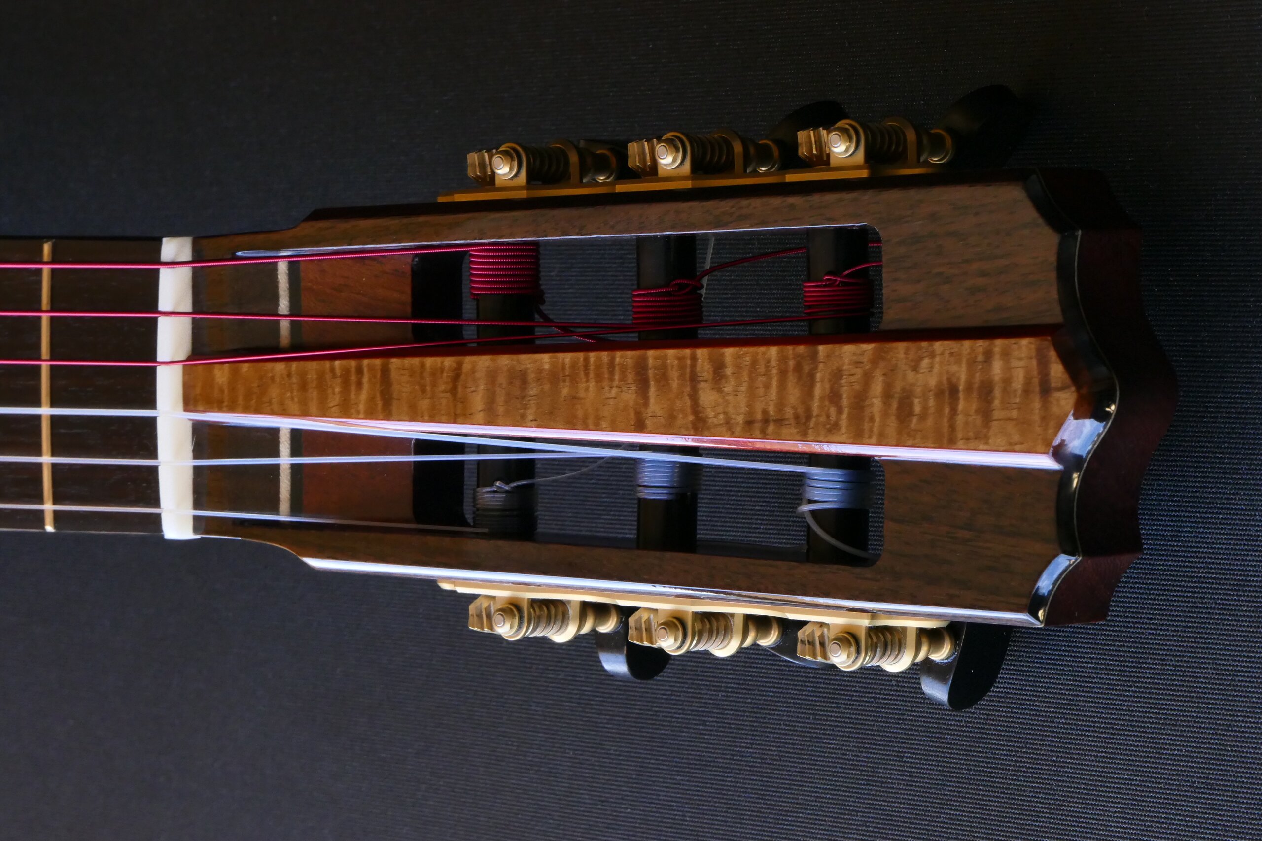 Custom guitars. Classical guitar headstock with raised centre panel