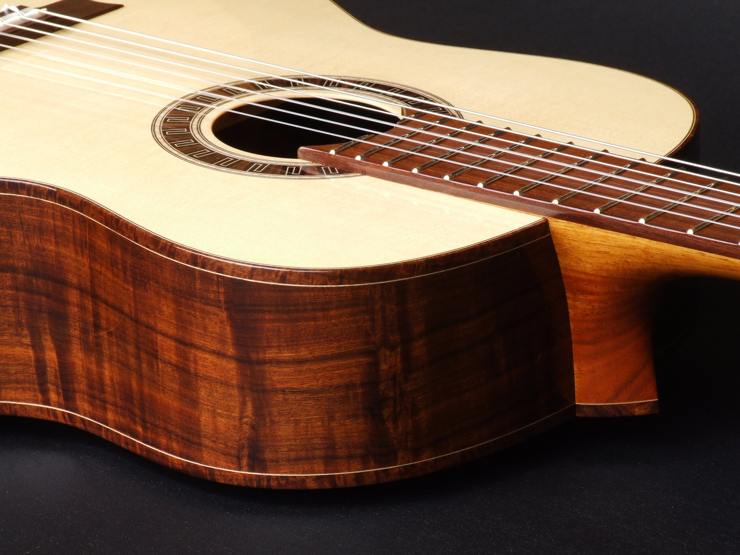 Custom guitars. Neck joint on a gidgee bodied classical guitar by Trevor Gore