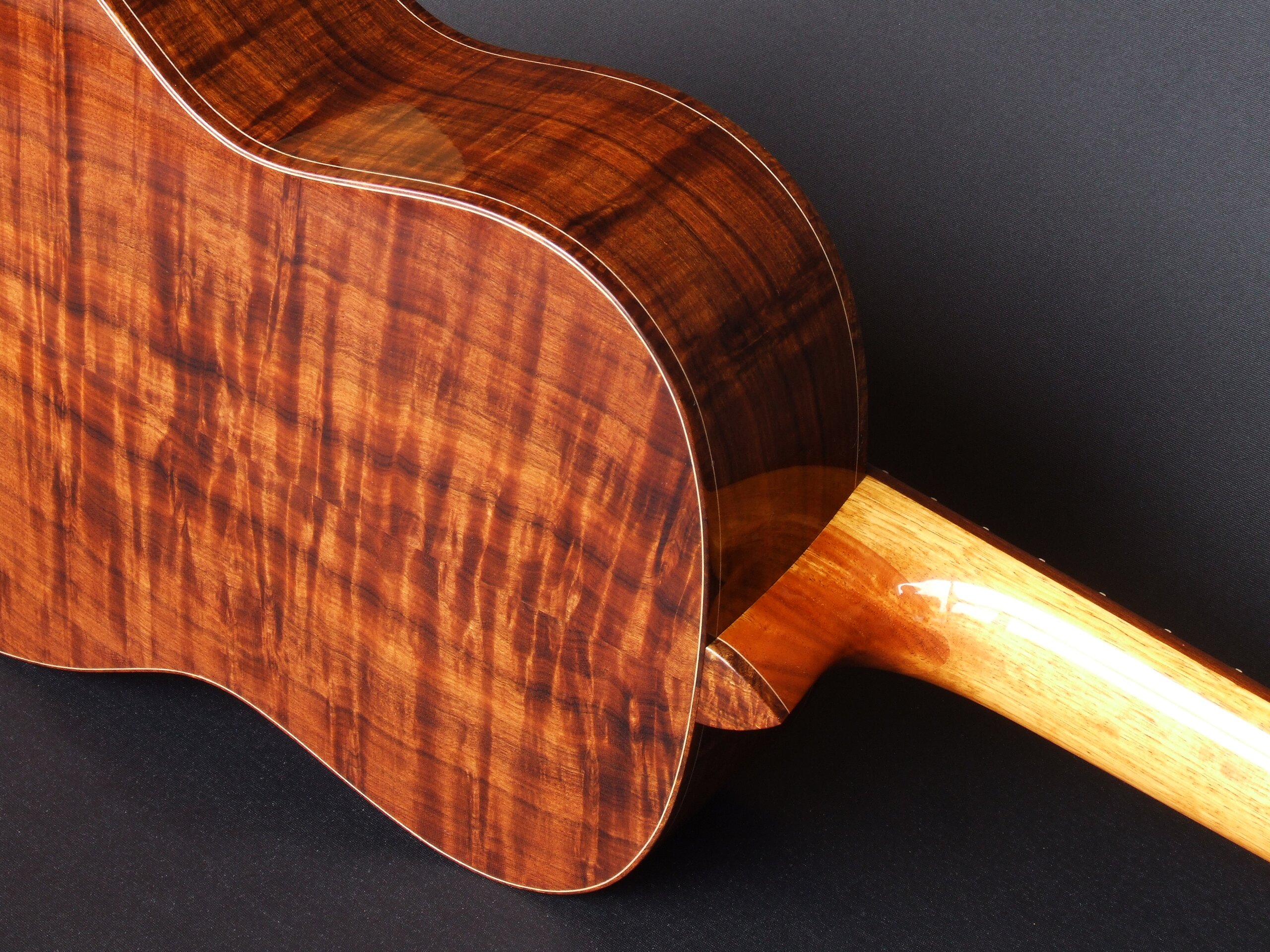 Custom guitars. Trevor Gore classical guitar with figured gidgee back and sides