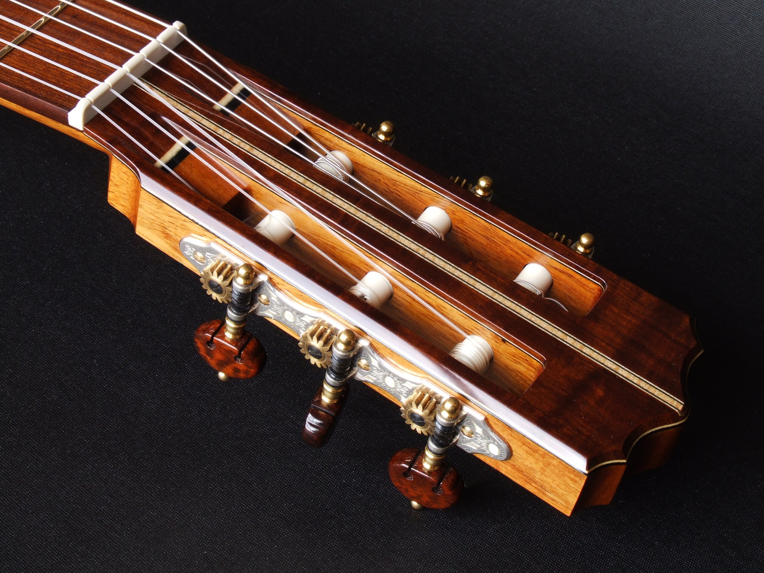 Custom guitars. Gidgee faced headstock with Rodgers tuners on a classical guitar