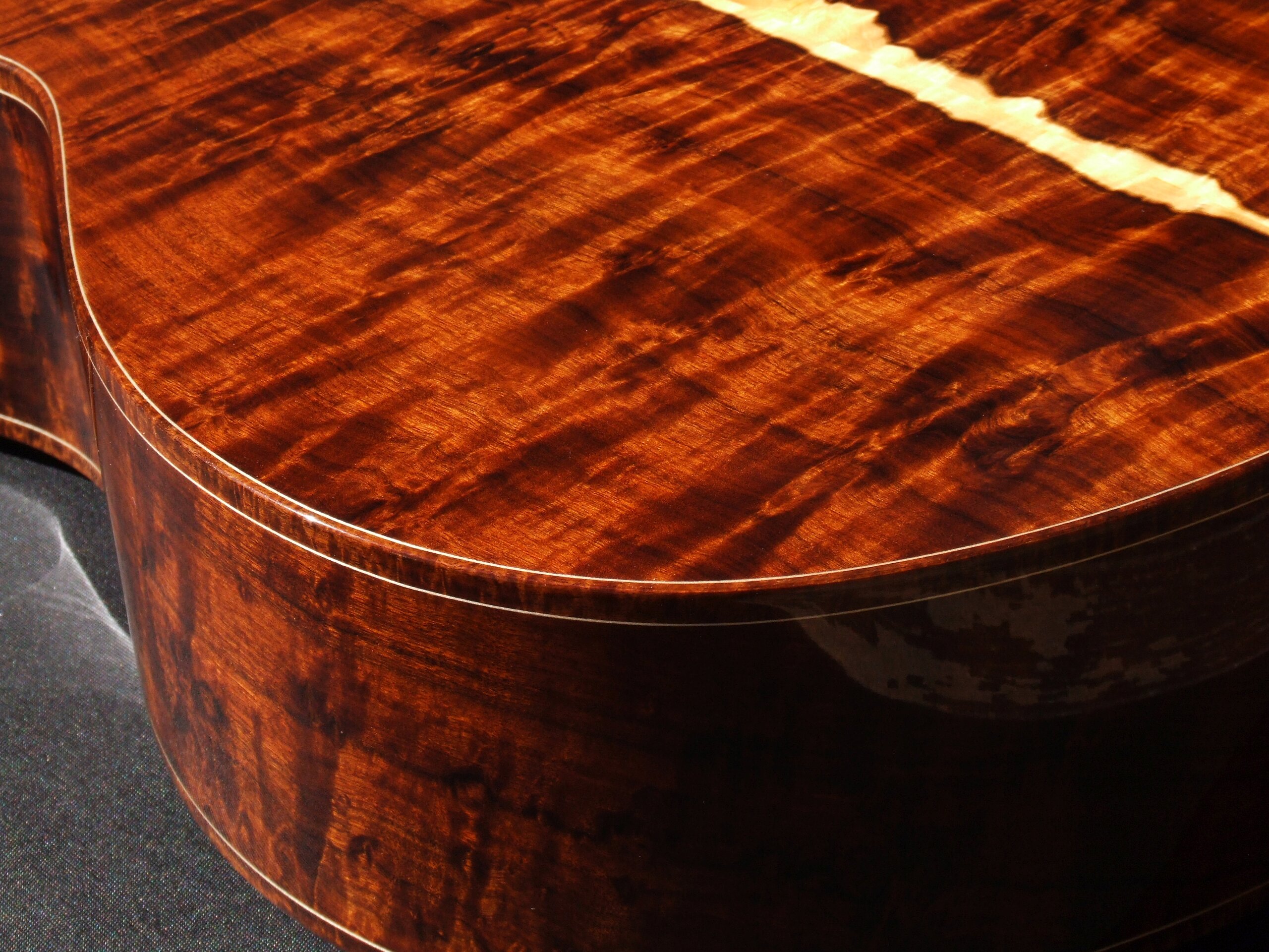 Custom guitars. Gore classical guitar with highly figured Gidgee back and sides