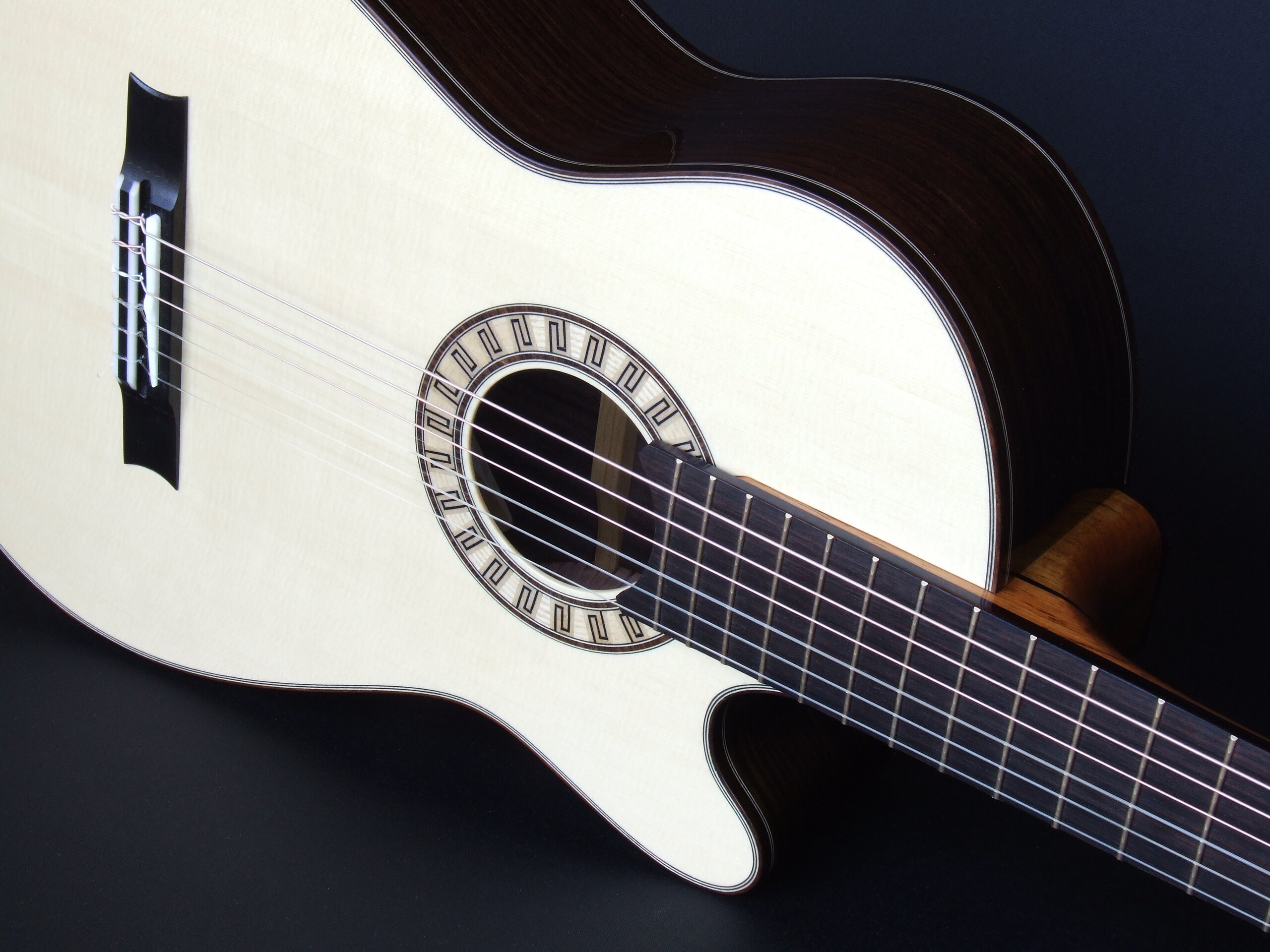 Custom guitars. Gore smallbody cutaway tilt-neck classical guitar